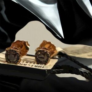 Elegant 1/4 carat chocolate diamond earrings by Le Vian.